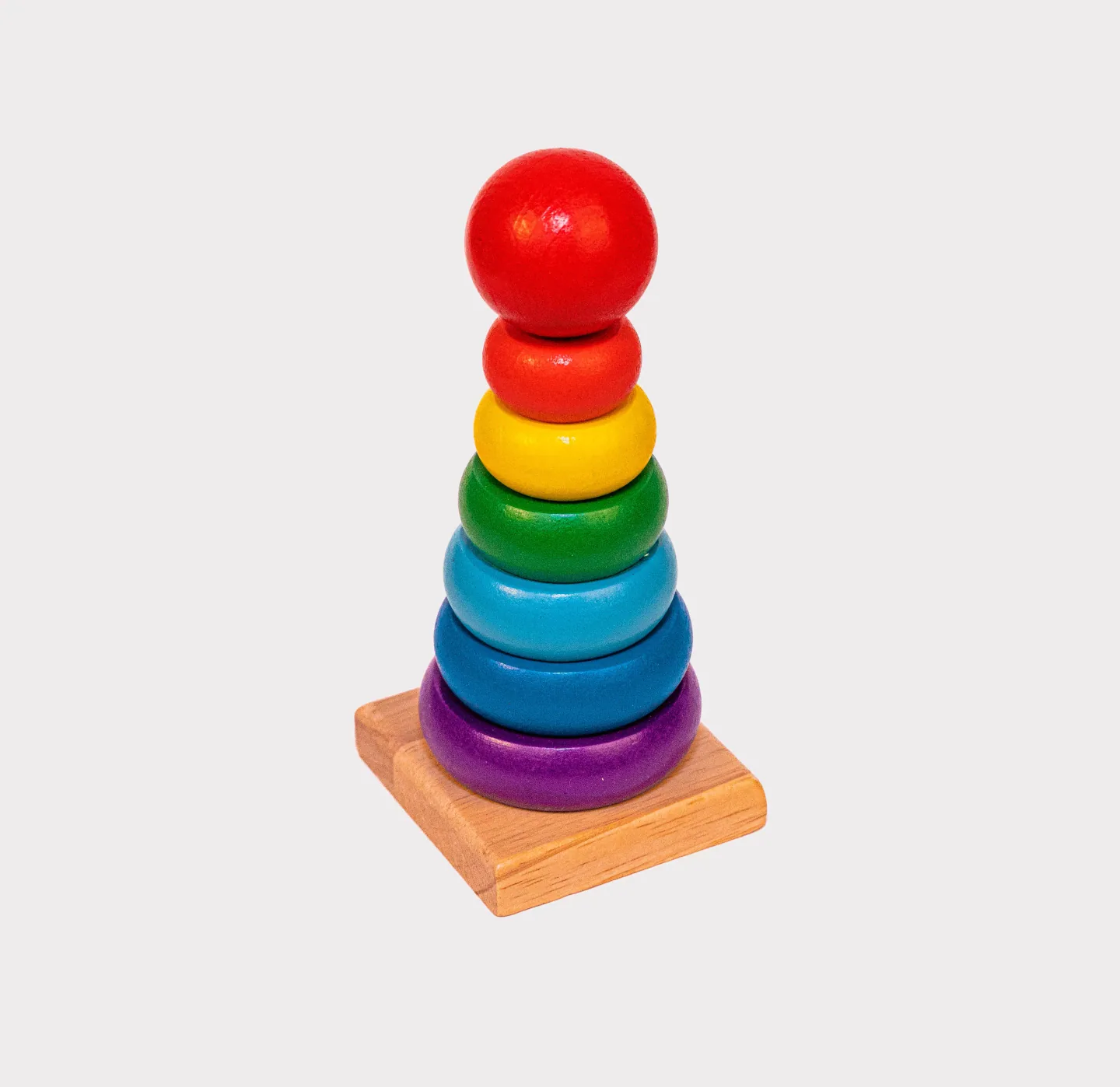 Torre de anillos de madera de colores para apilar