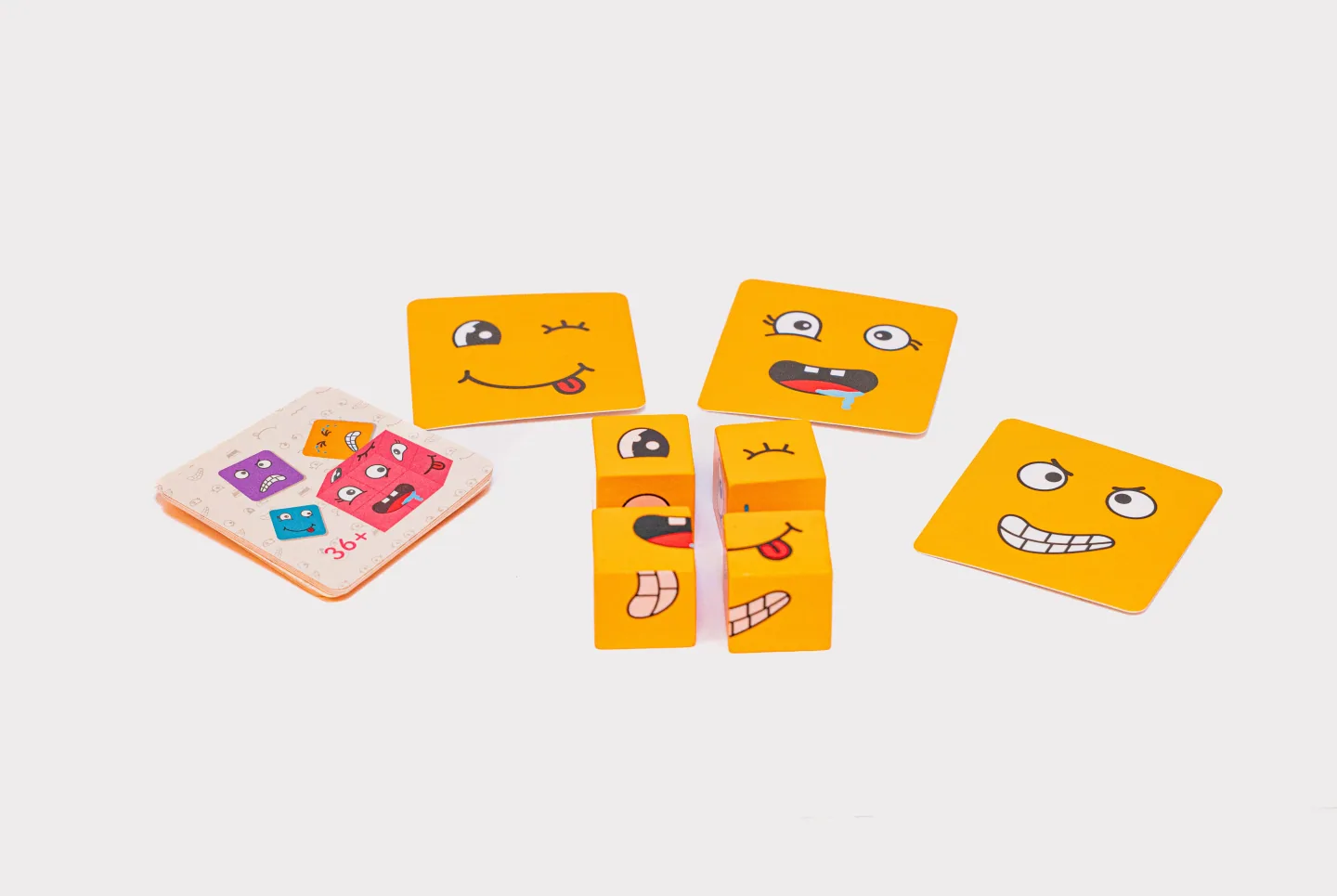 Puzzle de caritas: cubos de madera con tarjetas de expresiones